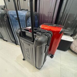 NEW Luxury, TUMI International 4, Vapor 22” Carry On.